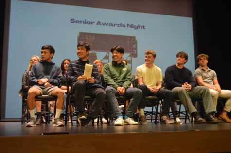 Seniors onstage await their awards
