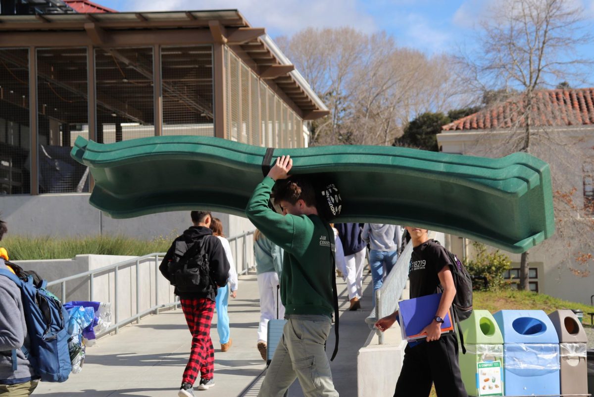 Junior Drew Kobal brought a slide instead of his typical backpack