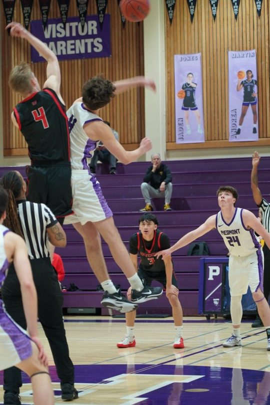 Junior Beach Lorin jumps for the tipoff at the start of the game.