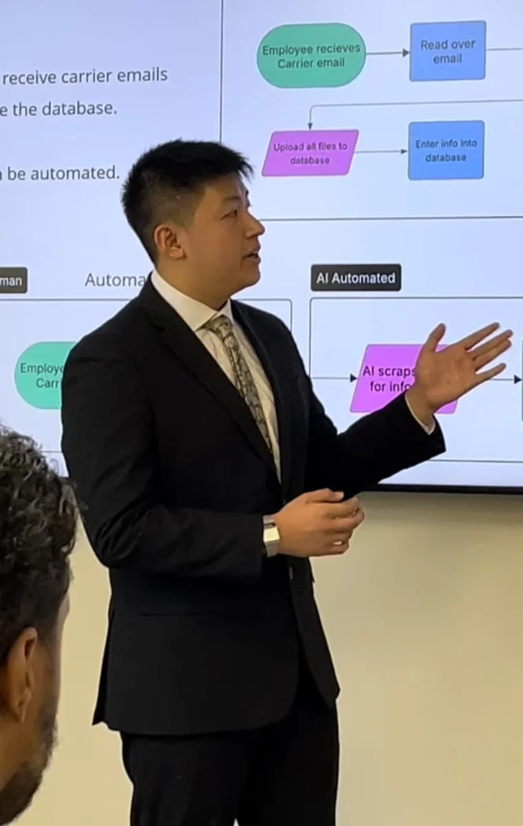 Yu presenting agentic-AI workflows at an internship