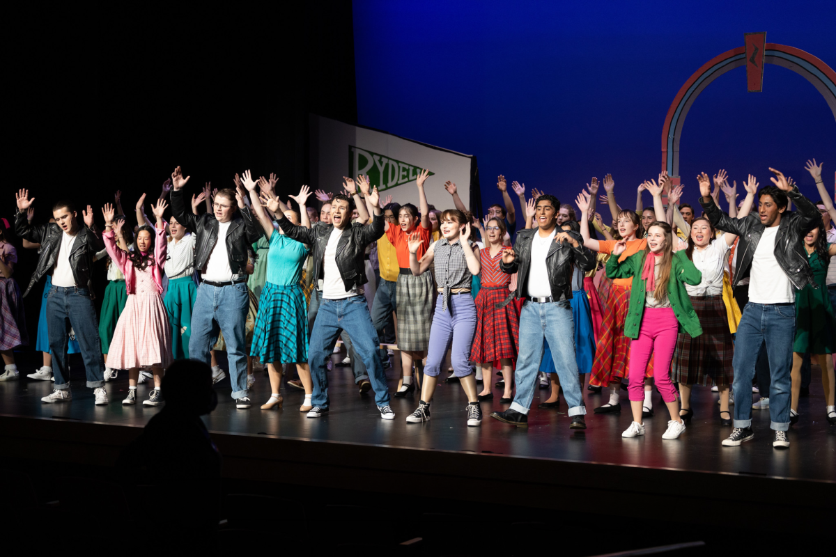 Recent Grease musical cast perfoming