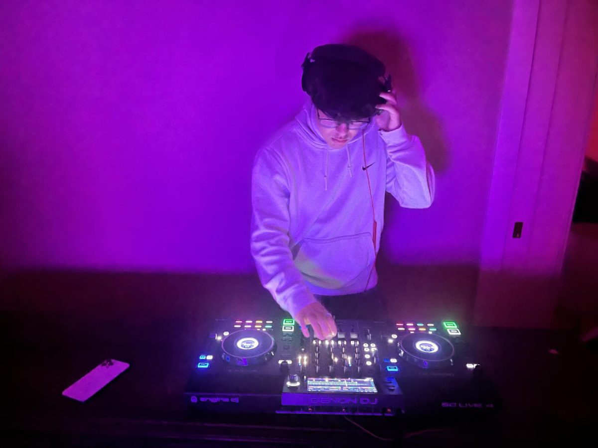 Senior Kian Ghaderi DJing
